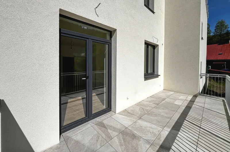 Ložnice s výhledem na les — apartmán A.1 — apartmán A.1